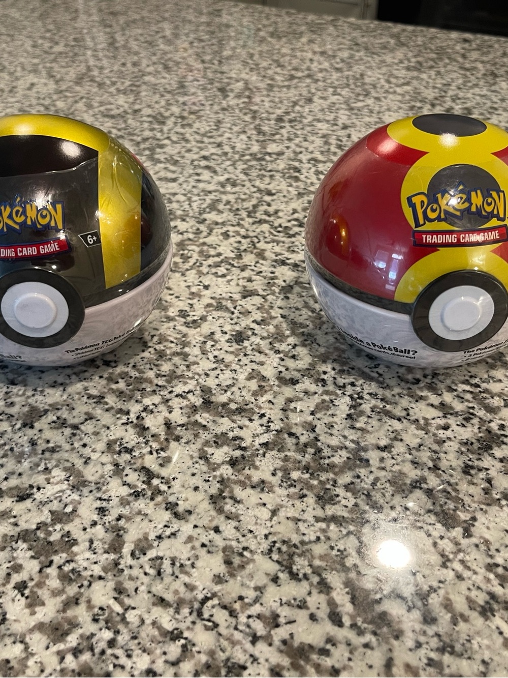 Pokemon Poké Ball Trading Card Tins - Red & Yellow and Black & Yellow